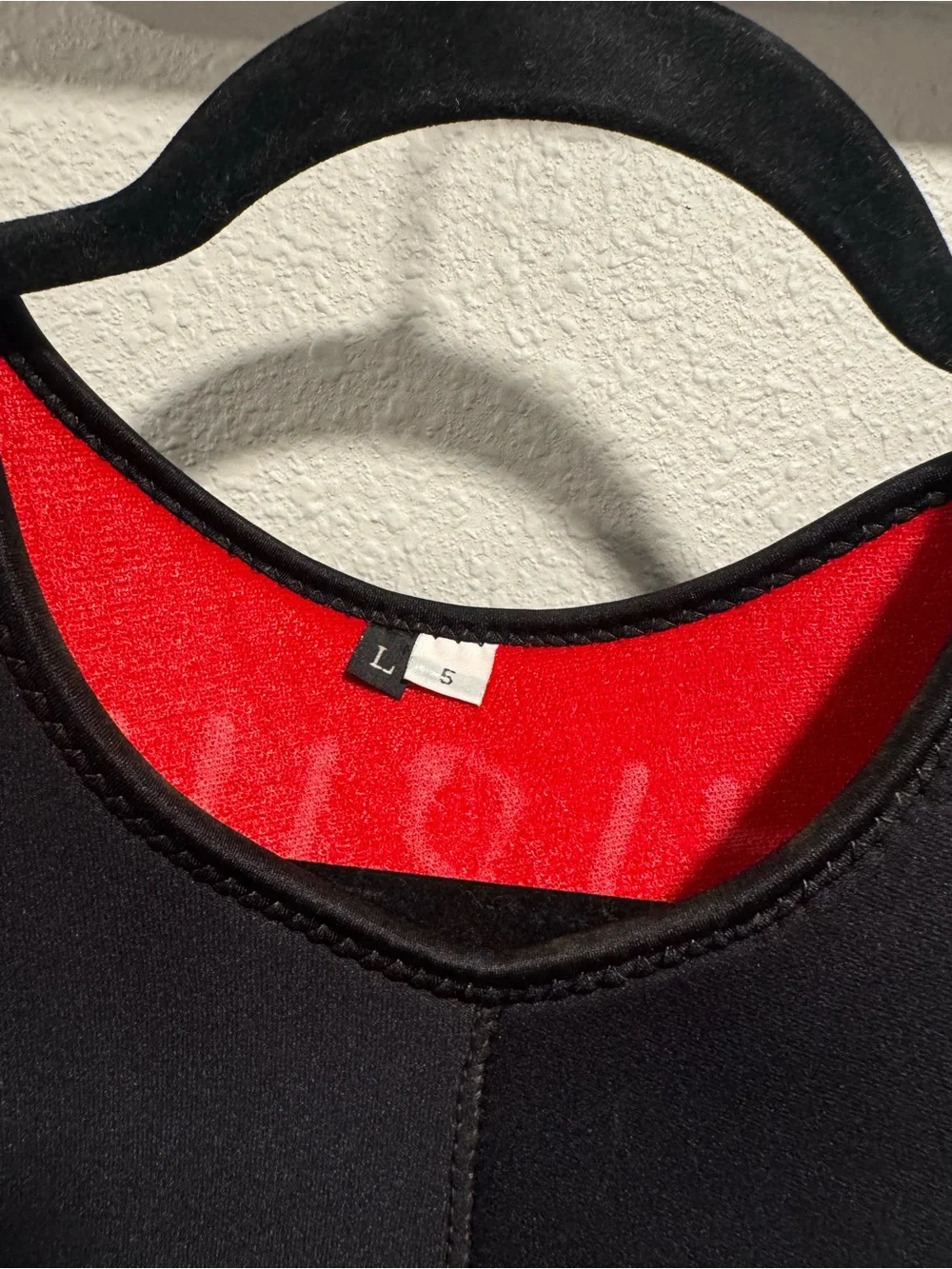Black One-Piece Wetsuit with Pink Accents